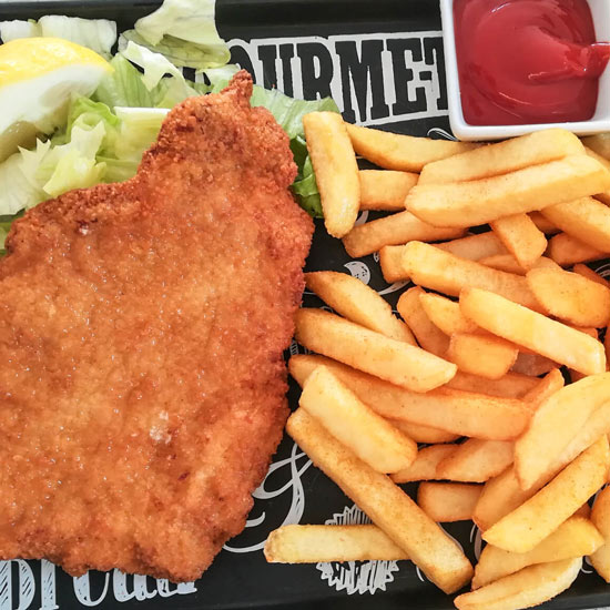 Schwein-Schnitzel mit Pommes frites, 180 g