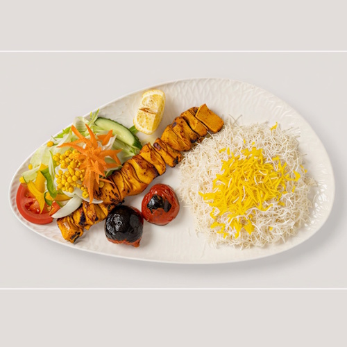 Djudjeh Kabab (mit Knochen)